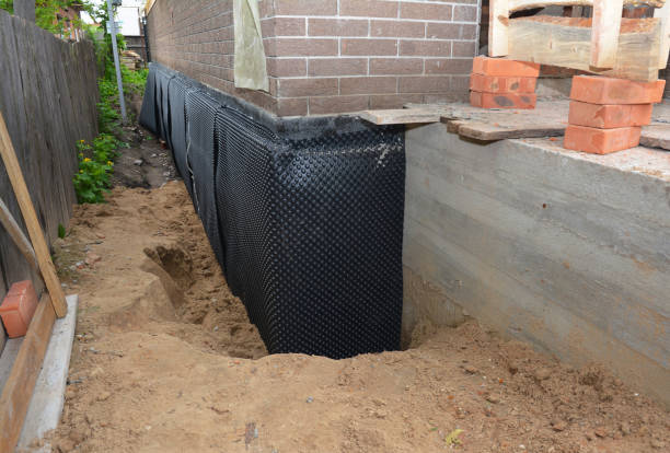 Happy homeowners after waterproofing job in Parrottsville
